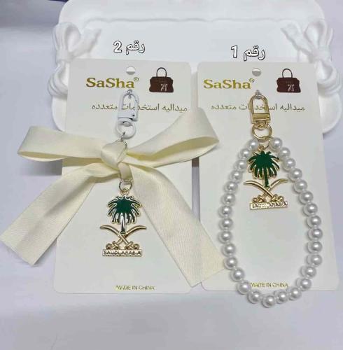 مجموعة 12 ميدالية لليوم الوطني