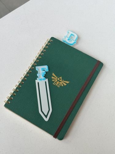 فاصل كتاب على شكل حرف