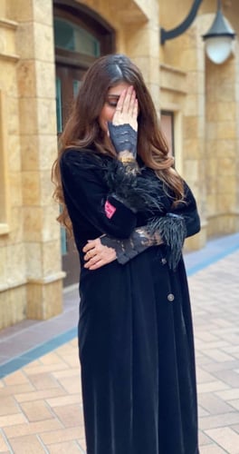 عباية أرياش