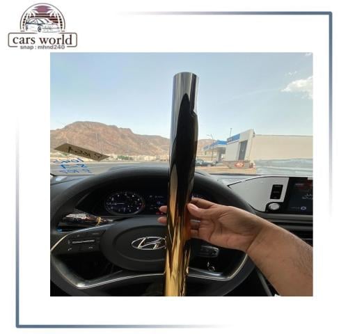 عازل تضليل الخليجي لونين اسود فوق وذهبي تحت