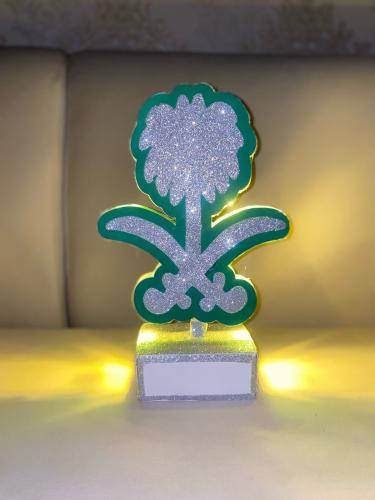 مجسم سيفين و نخلة