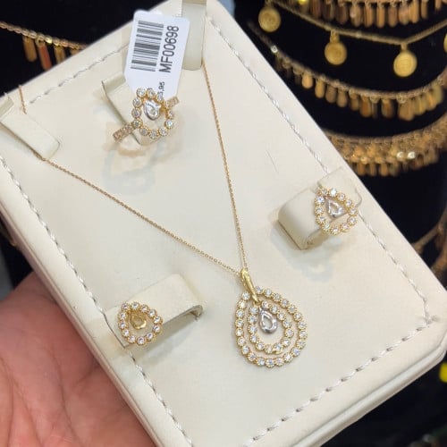 نص طقم 18K