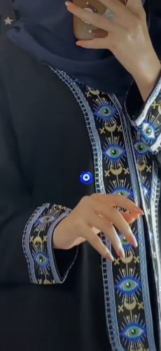 عين