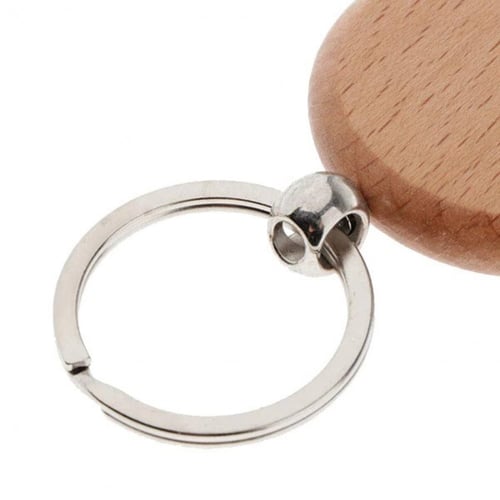 علاقة مفاتيح خشبية مع إمكانية الحفر عليها حسب الطل...