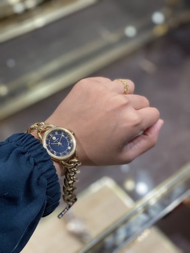 ساعة توري بورش ذهبي