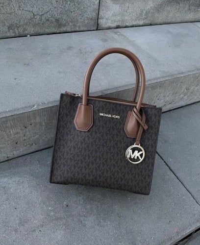 شنطة مايكل كورس بني