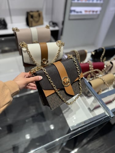 شنطة مايكل كورس بني