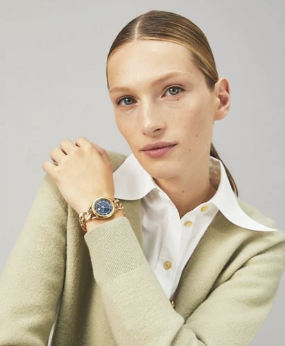 ساعة توري بورش ذهبي