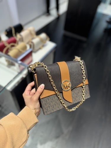 شنطة مايكل كورس بني