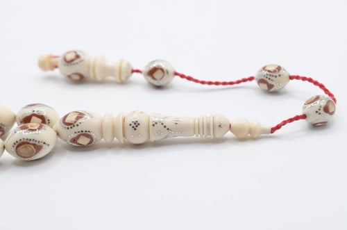 عاج ناب الفيل مطعم بالفضه و الكوك