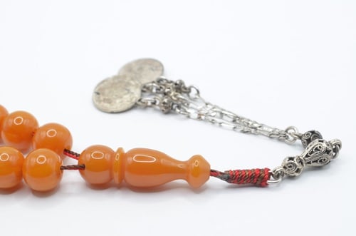 سبحه سندلوس ألماني لون مشمشي خيط مدبل