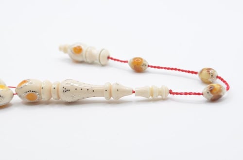 عاج ناب الفيل مطعم بالفضه والكهرمان