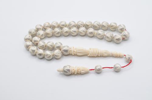 عاج ناب الفيل مطعم بالفضة