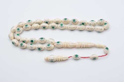 عاج ناب الفيل مطعم بالفضه وحجر الجاد