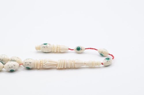 عاج ناب الفيل مطعم بالفضه وحجر الجاد