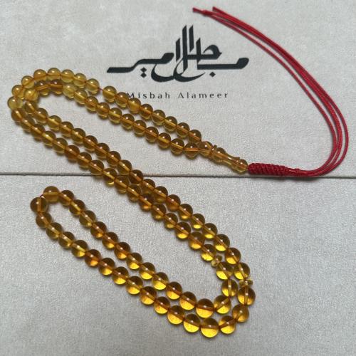 سبحة كهرمان طبيعي ( ذهب الرجال ) عسلي شفاف
