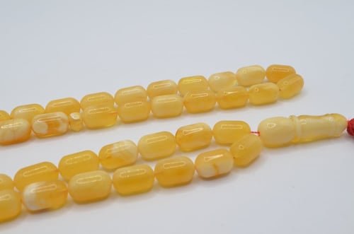 سبحة كهرمان طبيعي فرز مميز ملطخ بياض