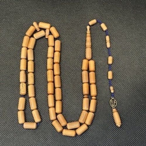 سبحة عاج ناب الماموث المنقرض