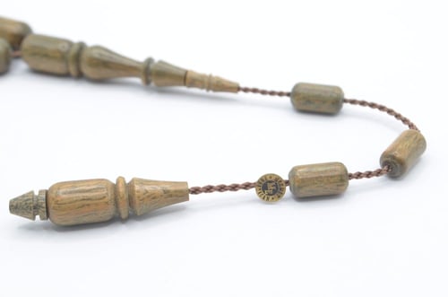 سبحة من خشب البلاسنك الرائع