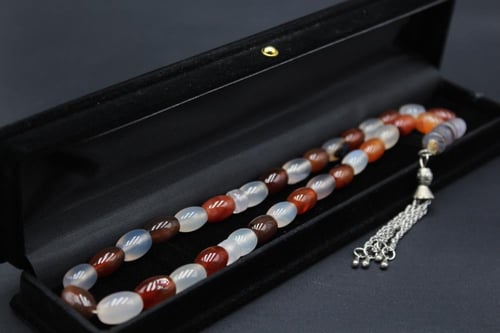 سبحة عقيق يماني مزهر _ 33 خرزة