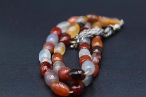 سبحة عقيق يماني مزهر _ 33 خرزة