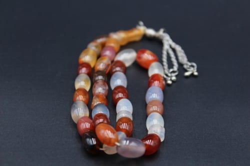 سبحة عقيق يماني مزهر _ 33 خرزة