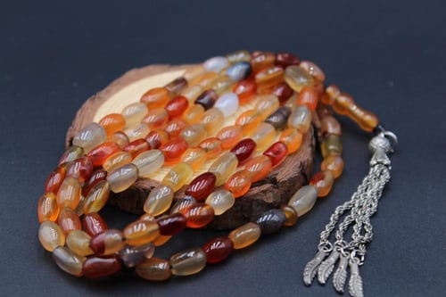 سبحة عقيق يماني مزهر حجم صغير _ 99 خرزة