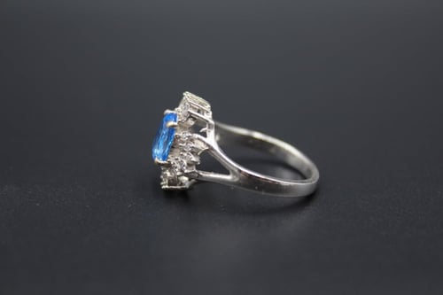 خاتم توباز لندني مقاس 7.25 انجليزي _ 15.5 عربي