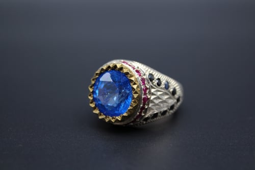 خاتم توباز لندني مقاس 10.75 انجليزي _ 24 عربي