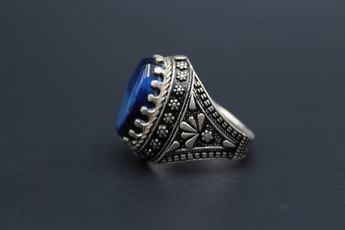 خاتم بحجر التايجر الأزرق مقاس 8.25 انجليزي _ 18 عر...