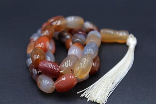 سبحة عقيق يماني مزهر حجم كبير _ 33 خرزة