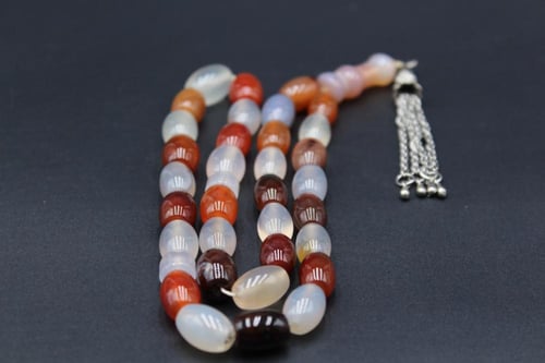 سبحة عقيق يماني مزهر _ 33 خرزة