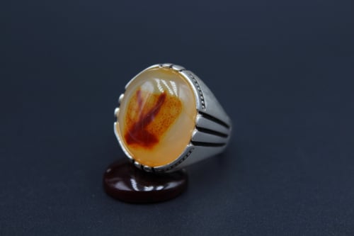 خاتم عقيق مصور مقاس 10.5 انجليزي _ 24 عربي