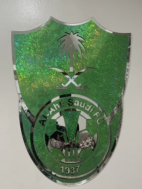 شعار الاهلي لامع مع خشب