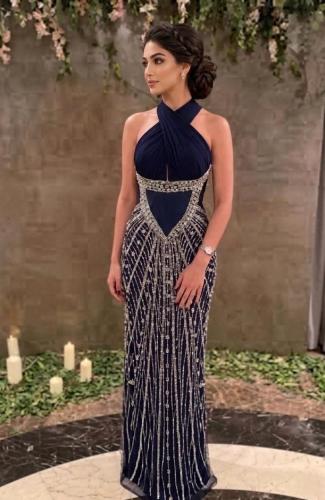 A dress with hand embroidery completely