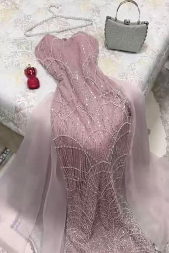 فستان قطعه تطريز يدوي مع اورجنزا لونين - بنك وزيتي