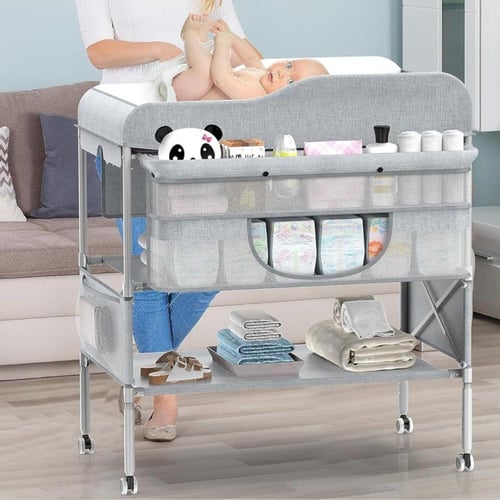 طاولة غيار وتنضيم اغراض الطفل قابلة للطي