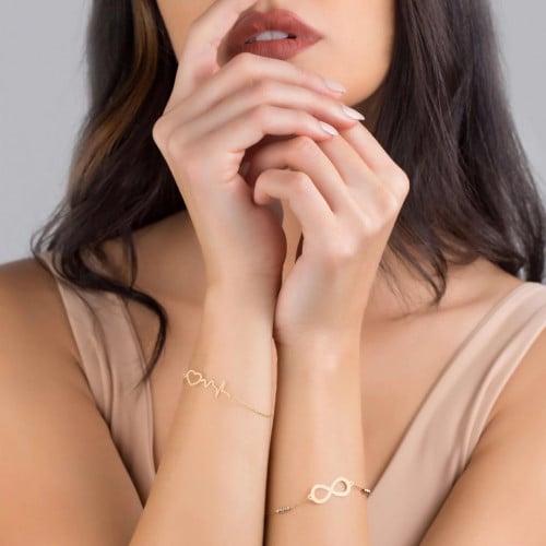 اساور مطلية بالذهب عيار 21 مع اسم من اختيارك