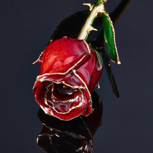 وردة مطلية بالذهب عيار ٢٤ قراط النوع الثقيل الاصلي...
