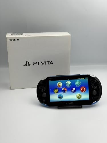 PS Vita Slim — Blue/Black (كامل في العلبة)