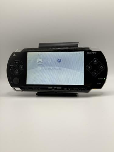 PSP 1000 — Piano Black (مع الشاحن)