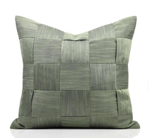 كوشن اخضر باستيل بتفاصيل متقاطعة