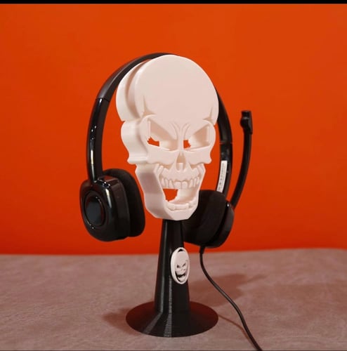 حامل سماعة الرأس بشكل جمجمة