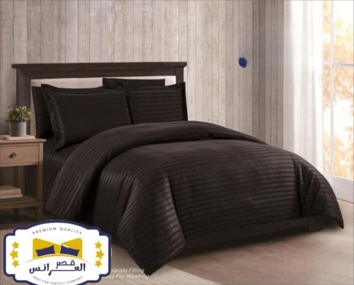 مفرش مقلم فندقي حشوه متحركة نفرين 7قطع