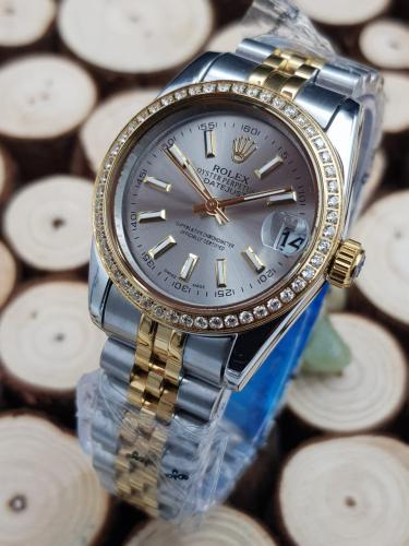 ساعه رولكس نسائي ضمان سنه وضد المويه