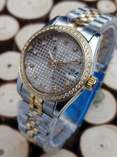 ساعه رولكس نسائي ضمان سنه وضد المويه