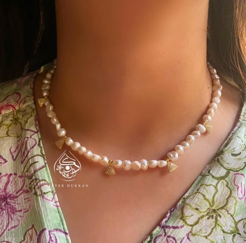 عقد لؤلؤ رومان