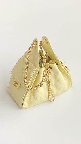 THE CHANEL 25 HANDBAG