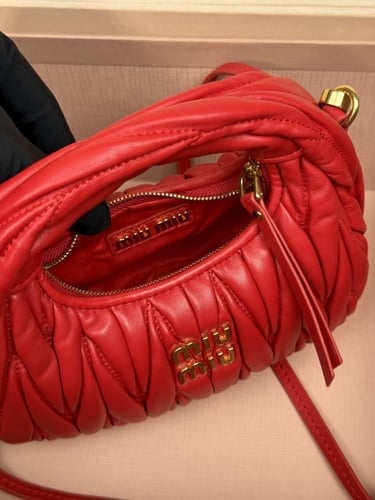 Wander matelassé nappa leather hobo mini-bag