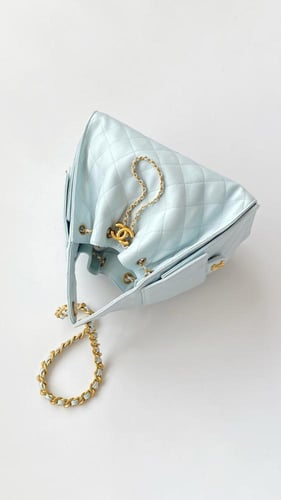 THE CHANEL 25 HANDBAG